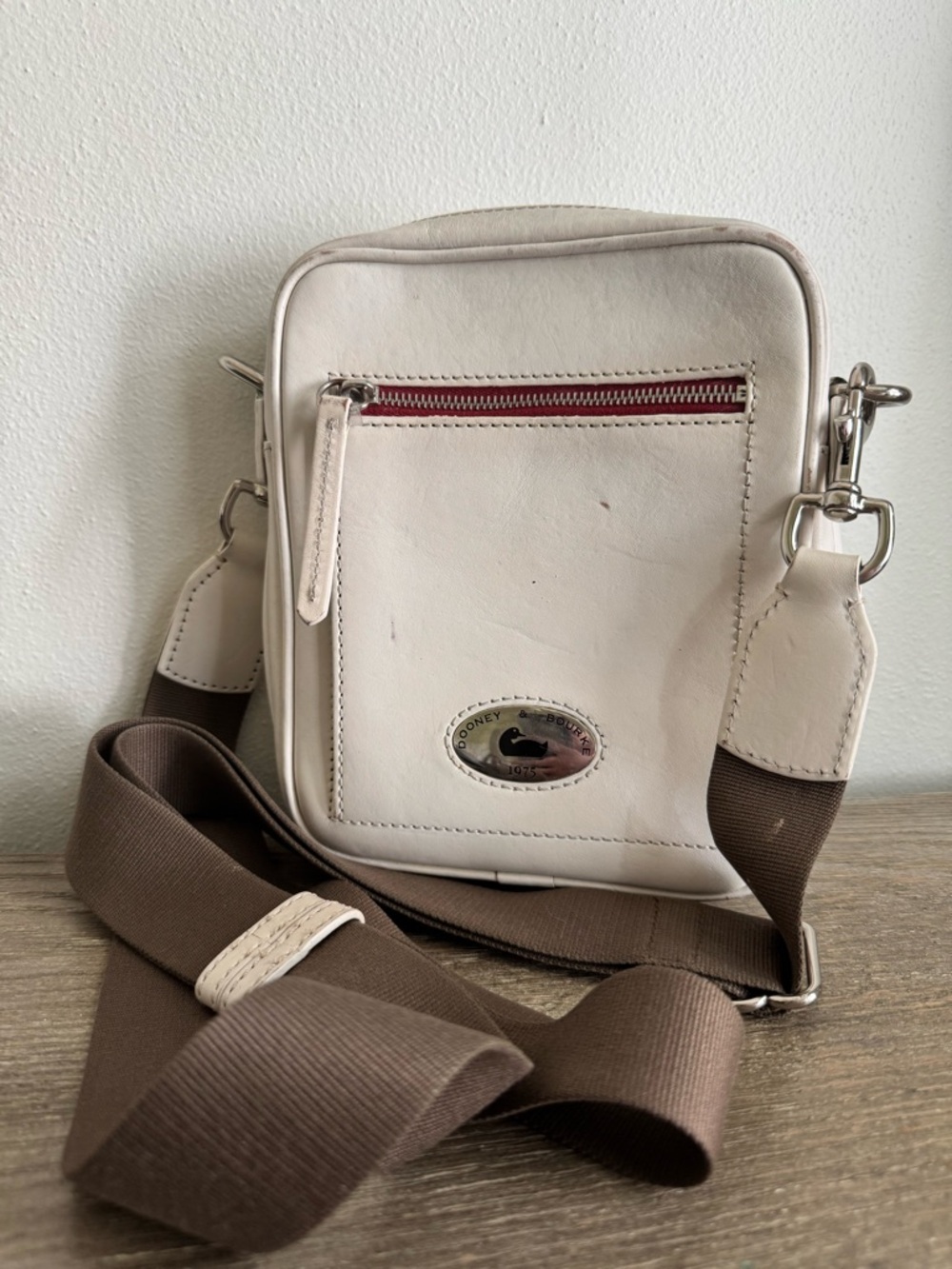 Dooney and Bourke White Leather Crossbody Bag with Brown Strap